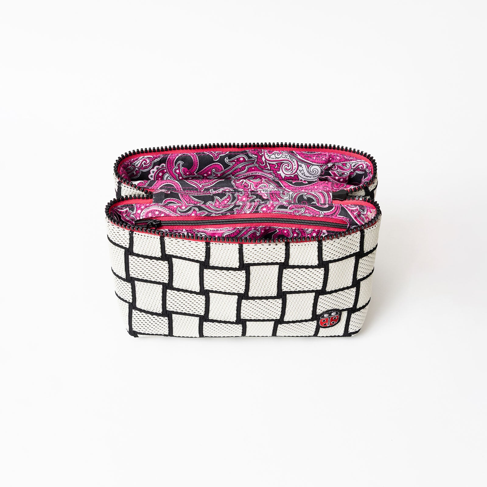 Intérieur de la trousse de toilette TWIN Décalée Medium – par Venitee Family