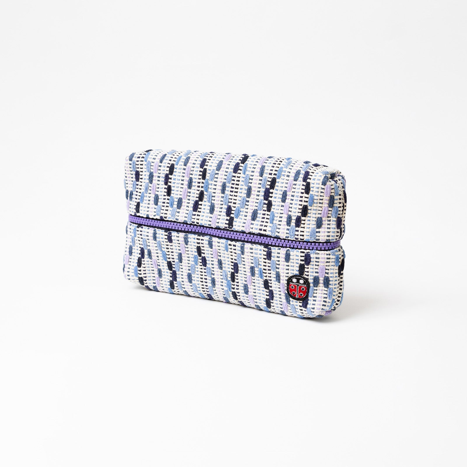 Vue de profil fermée de la trousse de toilette TWIN Granny Small – par Venitee Family